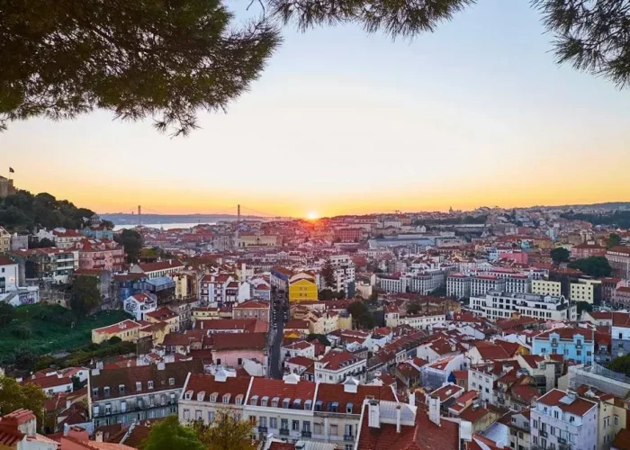 Sunset over Lisbon's rooftops.