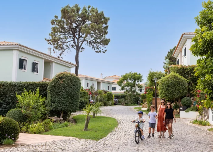 Family walking in a residential area.